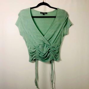 Almost Famous Large Mint Mid length crop top.